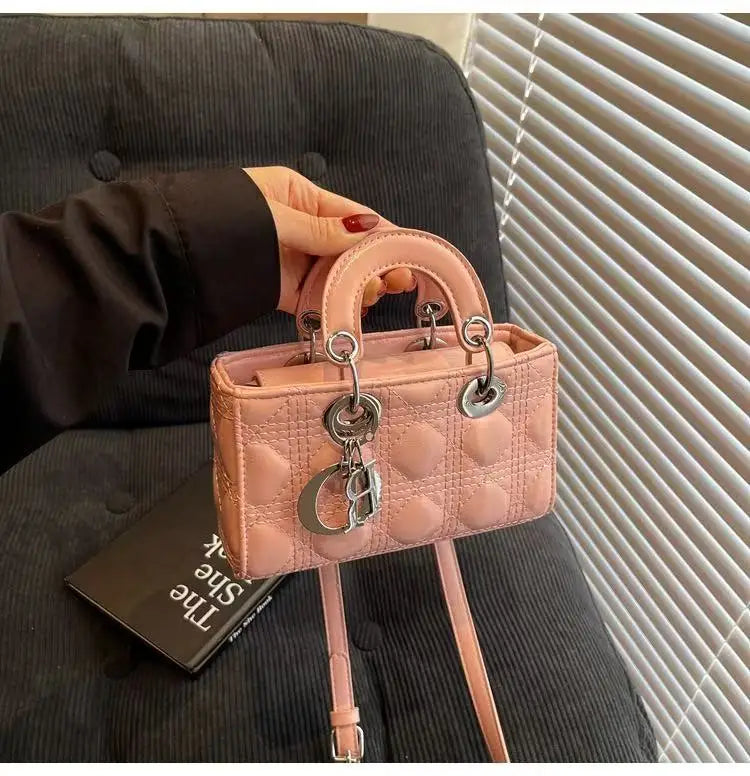 Elegant Designer Leather Clutch – Golden Hardware, Timeless Style