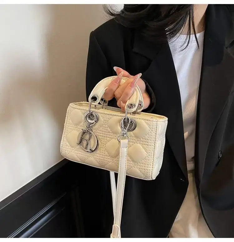 Elegant Designer Leather Clutch – Golden Hardware, Timeless Style