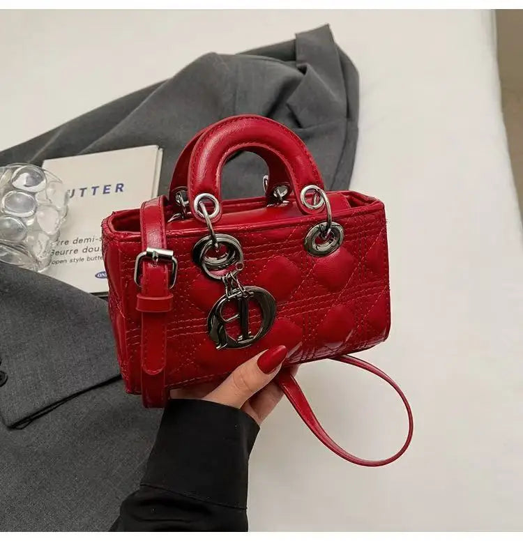 Elegant Designer Leather Clutch – Golden Hardware, Timeless Style