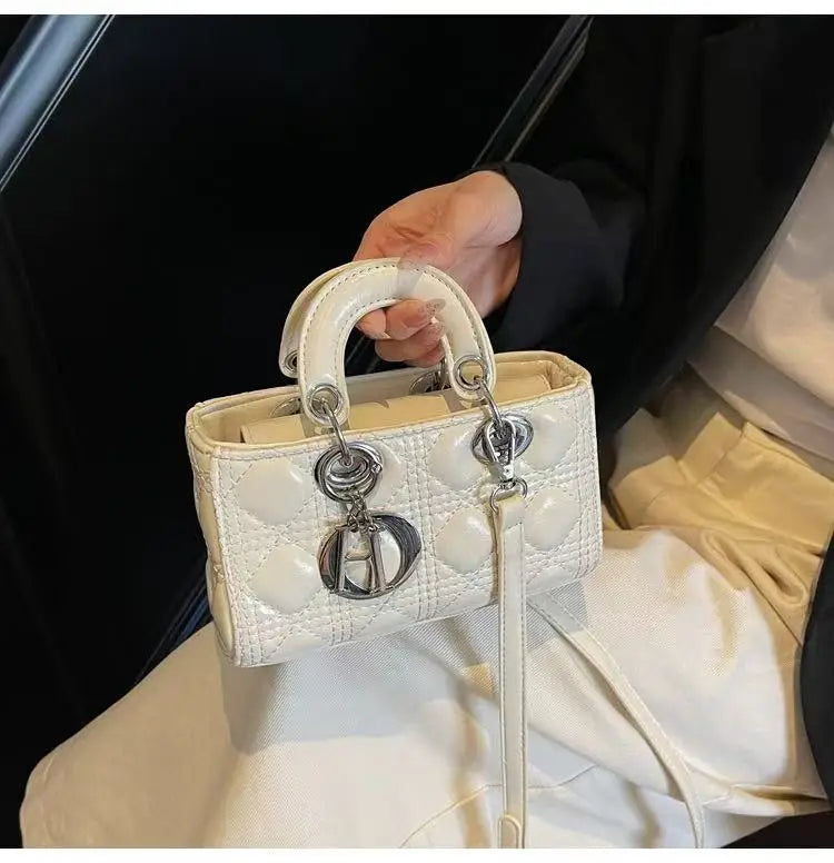 Elegant Designer Leather Clutch – Golden Hardware, Timeless Style