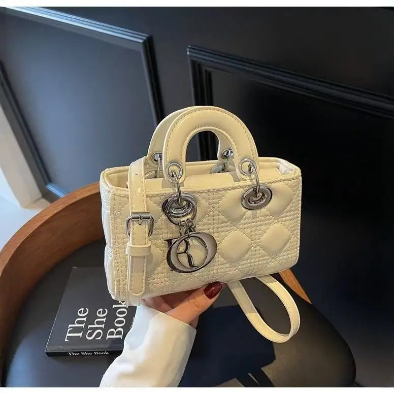 Elegant Designer Leather Clutch – Golden Hardware, Timeless Style