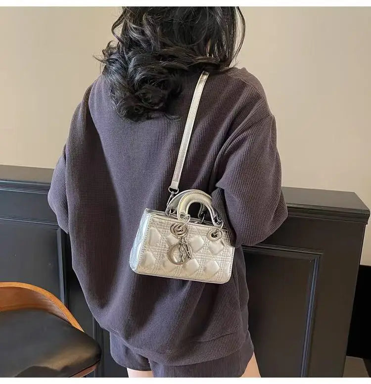 Elegant Designer Leather Clutch – Golden Hardware, Timeless Style