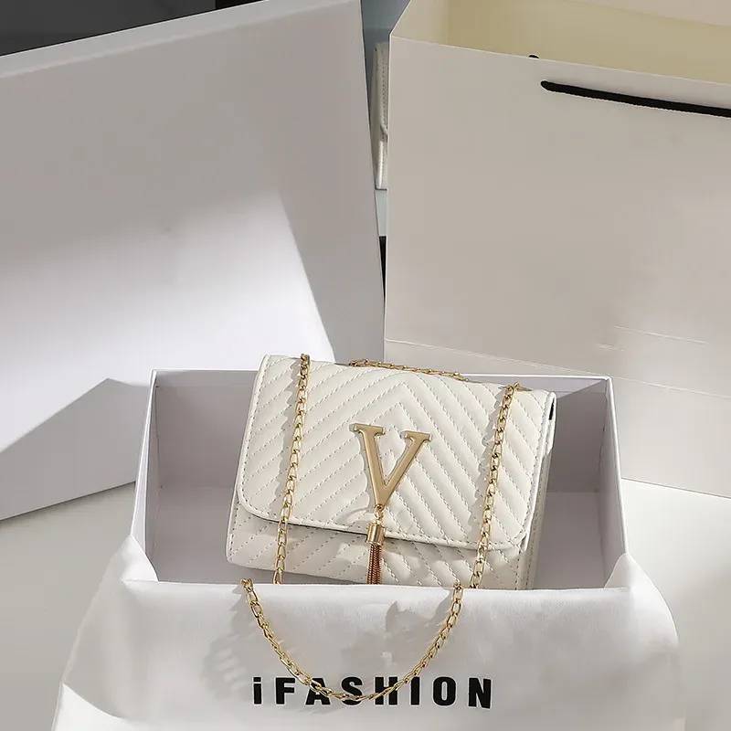 Embroidered Tassel Crossbody Bag